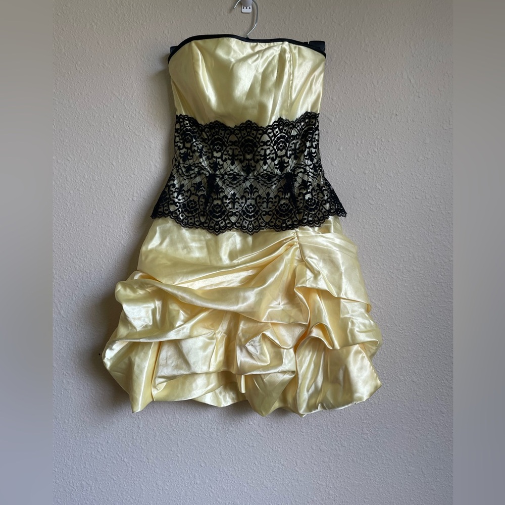 Yellow dress with black lace